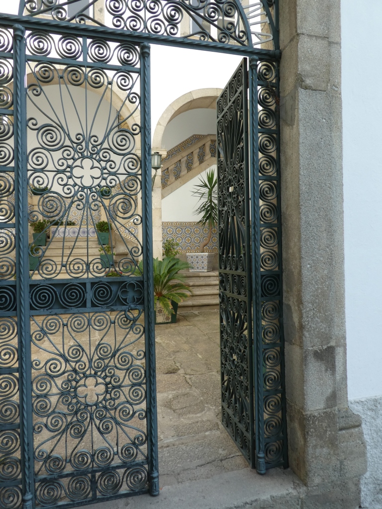 Elegant grille gates to secure courtyard